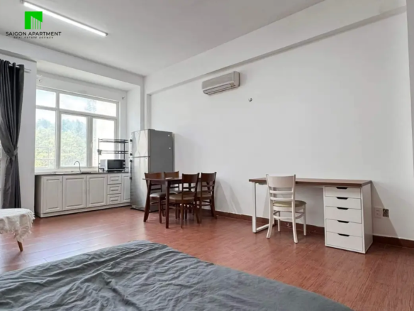 Large serviced studio with balcony for rent in HCMC centre